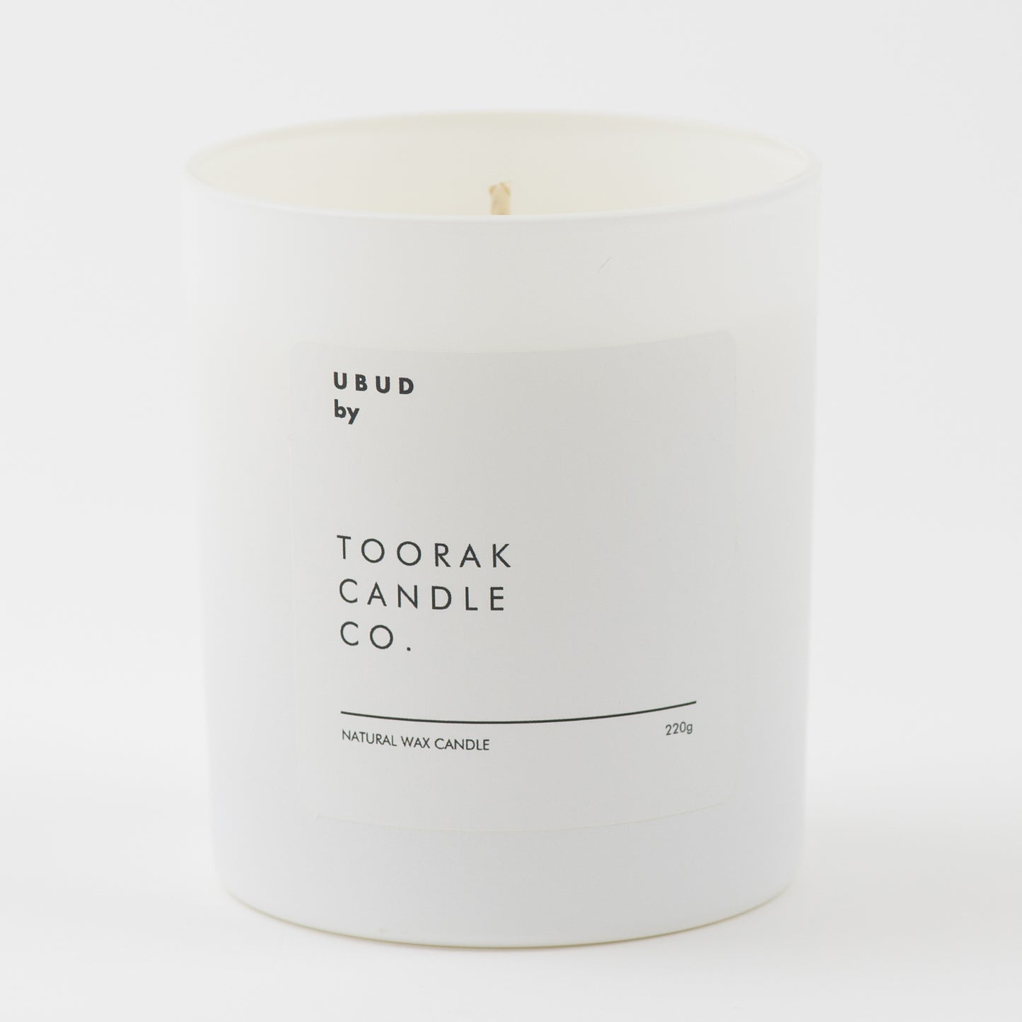 UBUD natural wax candle on white background
