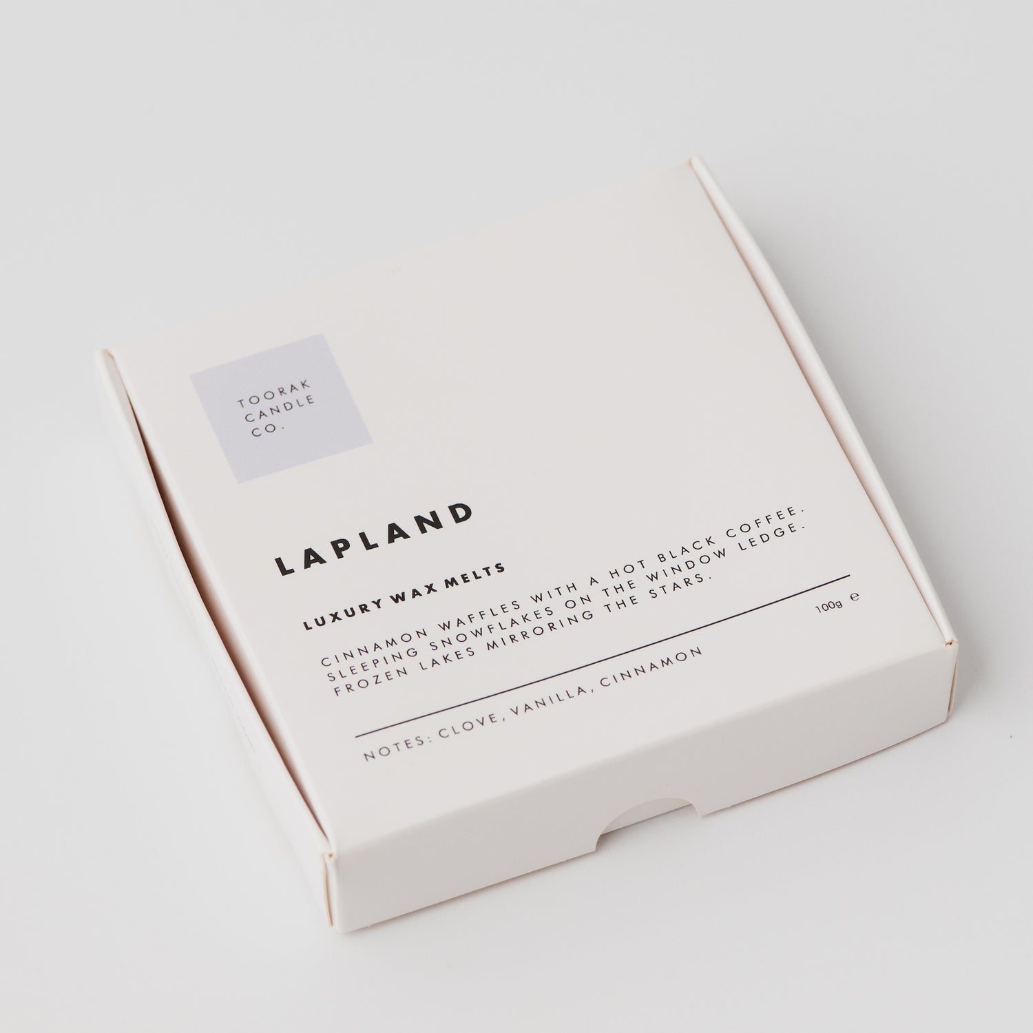 Lapland wax melts in minimal packaging box on a plain white background