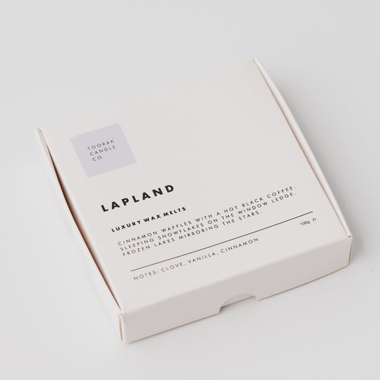 Lapland wax melts in minimal packaging box on a plain white background