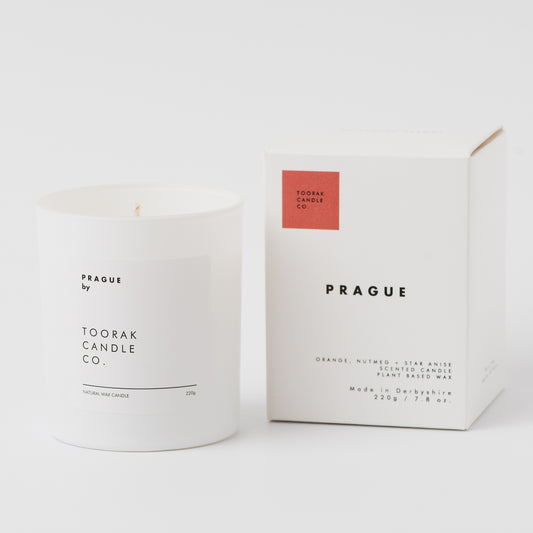 Candle and packaging of Toorak Candle Co. with 'Prague' branding on a white background