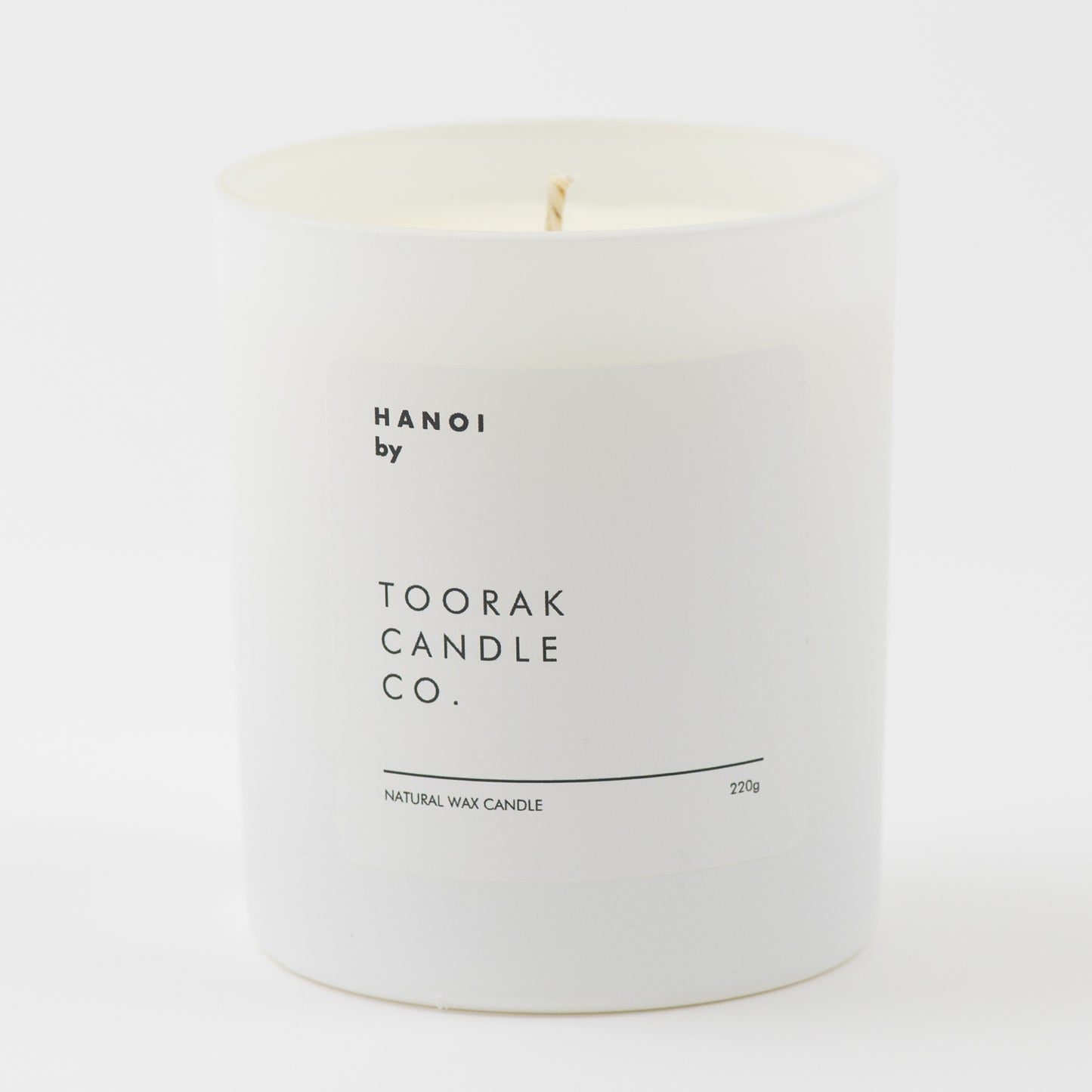 HANOI natural wax candle on plain background 