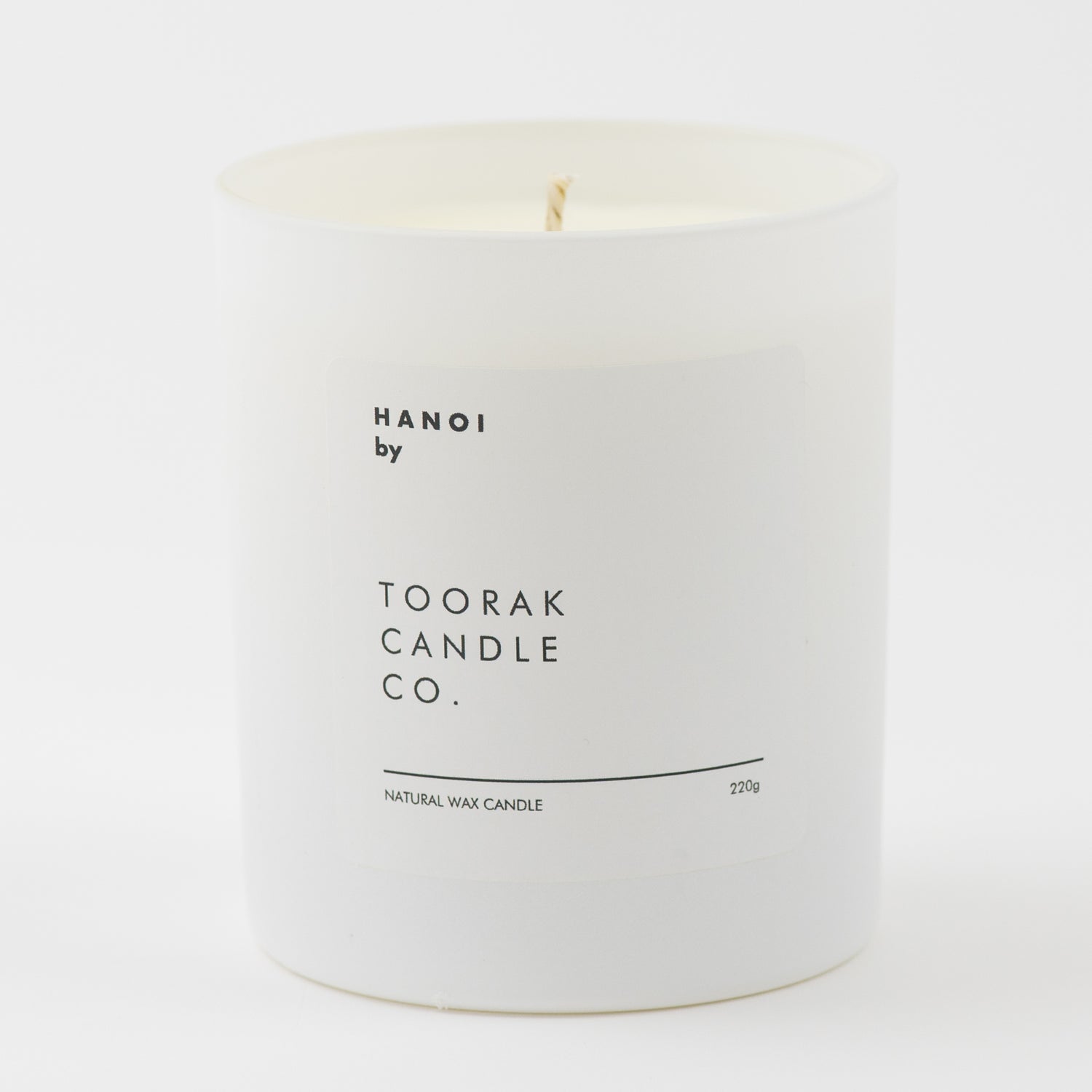HANOI natural wax candle on plain background 