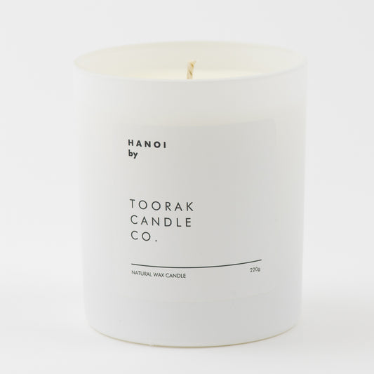 HANOI natural wax candle on plain background 